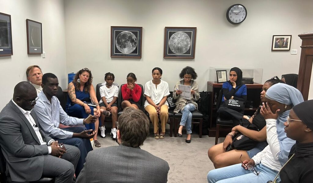 A group of Ohioans meets with Senator Brown's office to talk about their experiences with a loved ones' deportation.